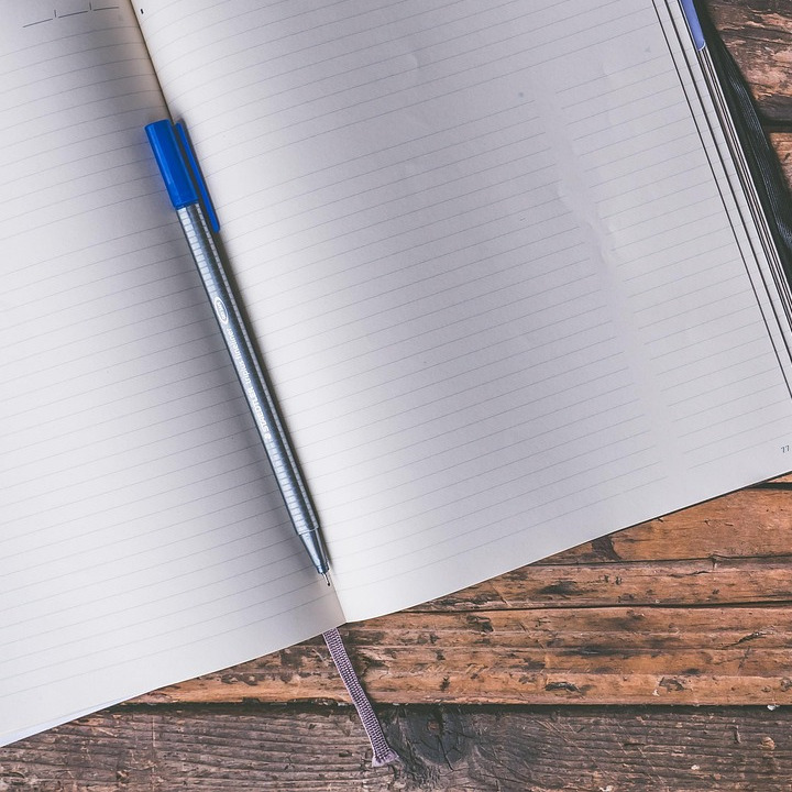Professional desk and notebook placeholder for owner photo